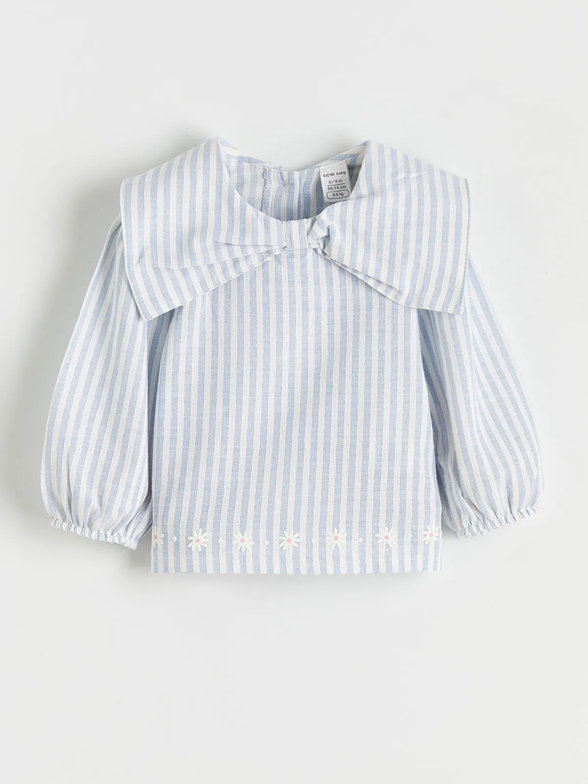 Off-White Striped Blouse and Leggings with Bow Collar Detail